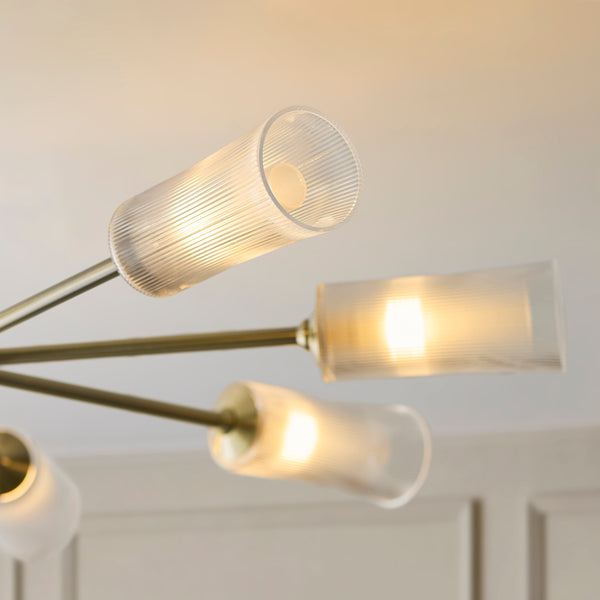 Close-up of the clear ribbed glass on the Avelyn 8 Light Chandelier