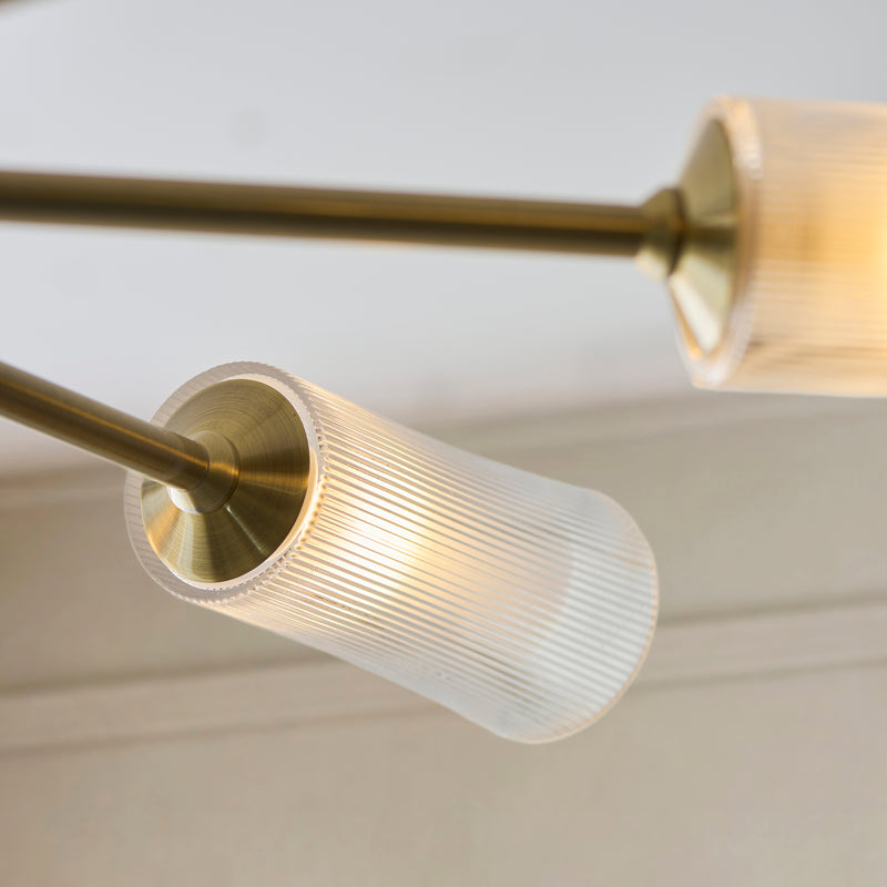 Detail of the antique brass finish on the Avelyn 8 Light Chandelier