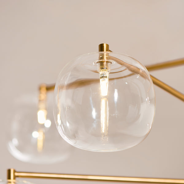 Close-up of the clear glass on the Oslo 6 Light Linear Pendant