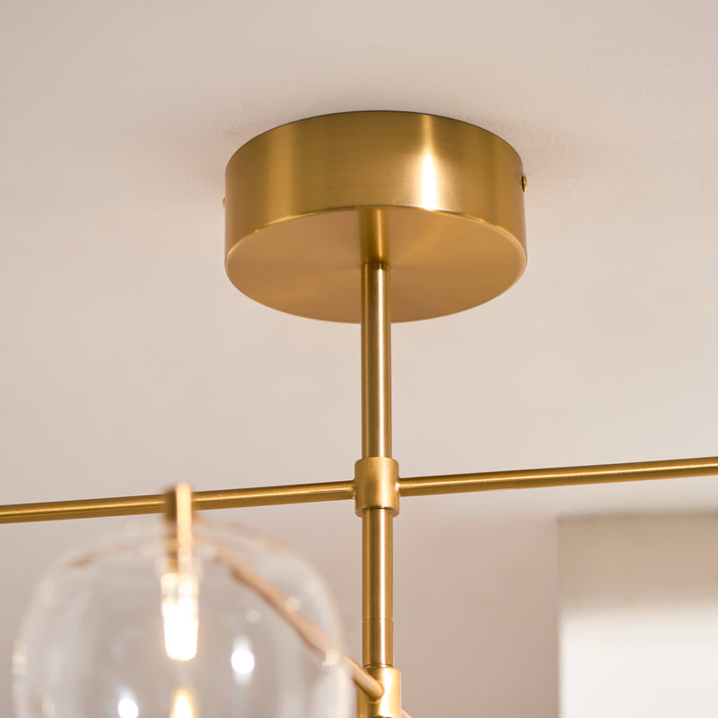 Oslo 6 Light Linear Pendant detail showing the clear glass and fittings