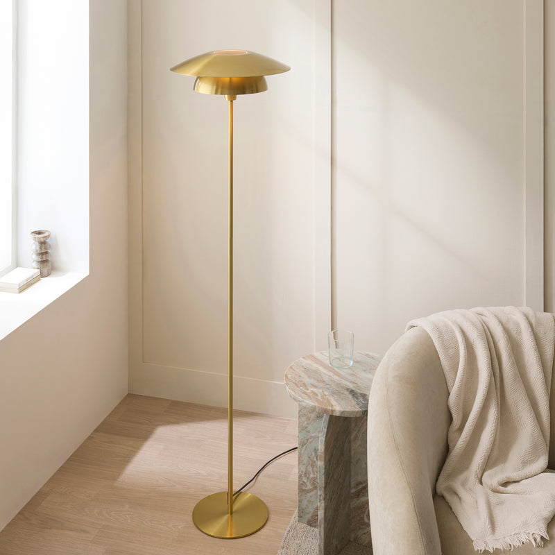 Lyon Floor Lamp lit up in a living room setting