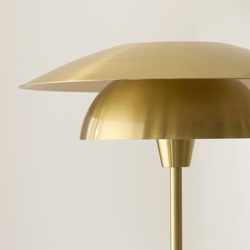 Lyon Floor Lamp lit up in a living room setting