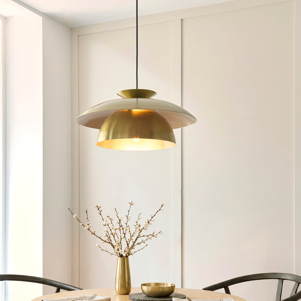 Lyon Pendant lit up in a styled dining room