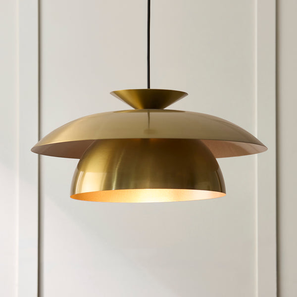 Lyon Pendant in satin brass shown in a room setting