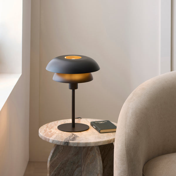 Endon Lyon Table Lamp in matt black in a styled bedroom