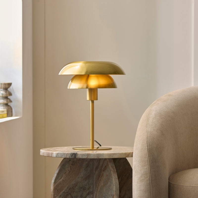 Lyon Table Lamp lit up in a bedroom setting