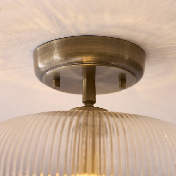 Detail of the antique brass finish on the Harborne Flush Ceiling Light