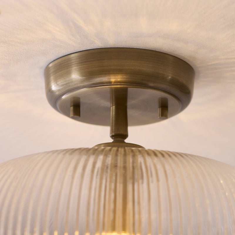 Detail of the antique brass finish on the Harborne Flush Ceiling Light