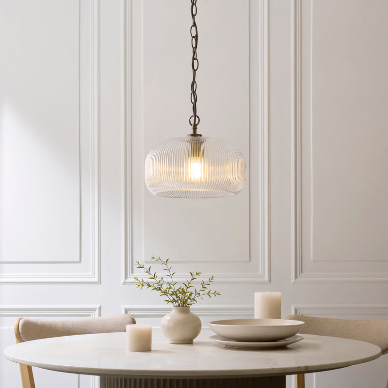 Harborne Pendant lit up in a styled kitchen