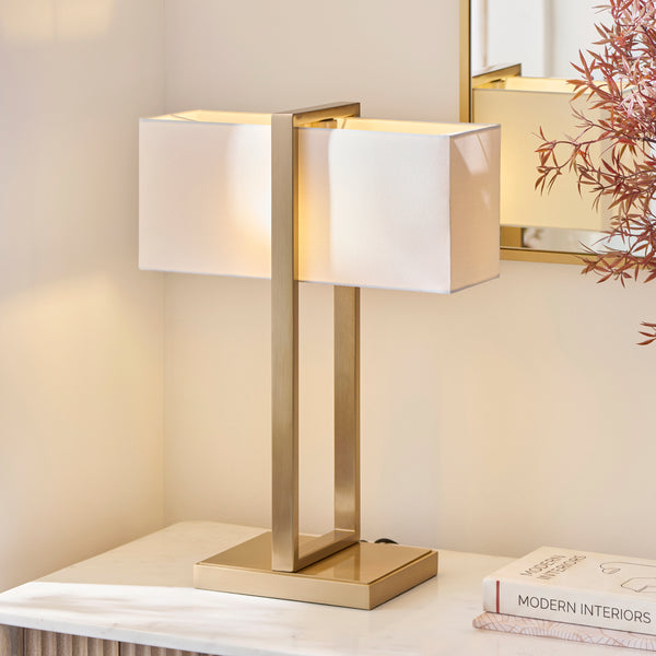 Seattle Table Lamp lit up in a living room setting