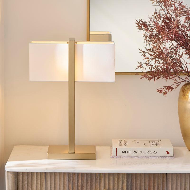 Seattle Table Lamp lit up in a living room setting
