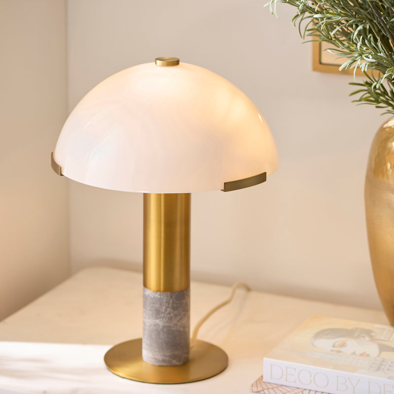 Hansel Table Lamp lit up in a bedroom setting