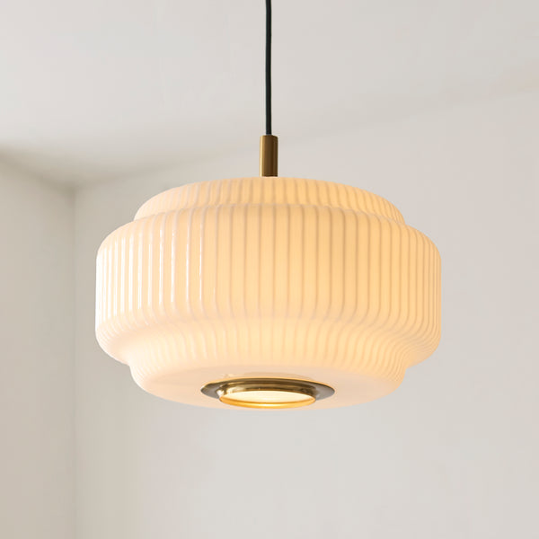 Evora Large Pendant lit up in a styled kitchen