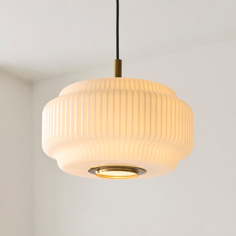 Evora Large Pendant lit up in a styled kitchen