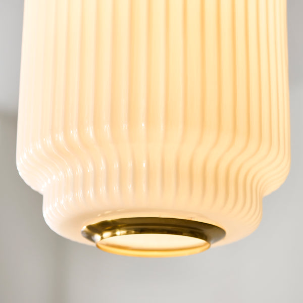 Close-up of the opal ribbed glass on the Evora Small Pendant
