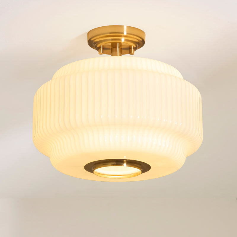 Evora Flush Ceiling Light lit up in a styled hallway