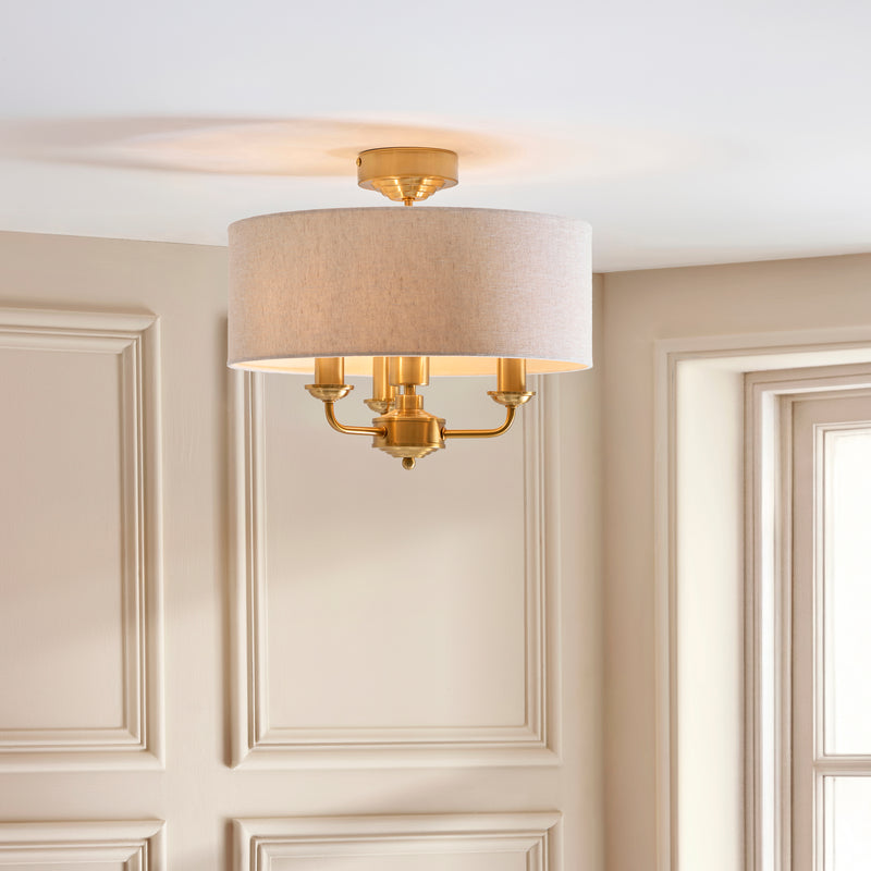 Highclere 3 Light Flush Ceiling Light in vintage brass and linen shown in a room setting
