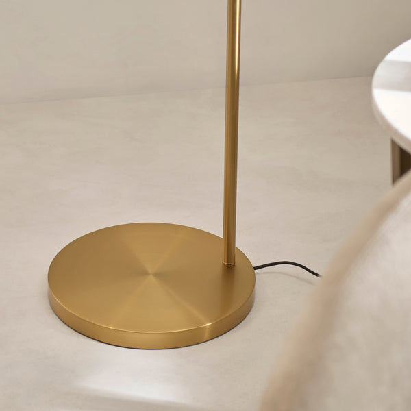 Detail of the warm brass finish on the Carlson XL Arc Floor Lamp