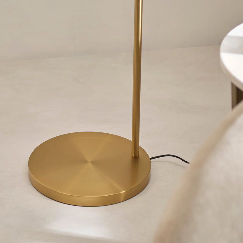 Detail of the warm brass finish on the Carlson XL Arc Floor Lamp