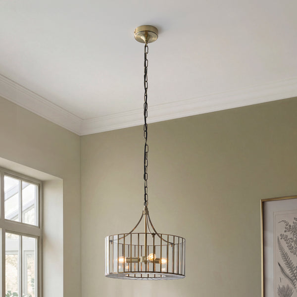 Antalya 3 Light Pendant lit up in a styled dining room