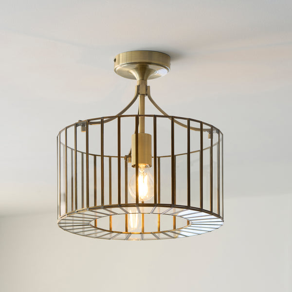 Antalya Flush Ceiling Light lit up in a styled hallway
