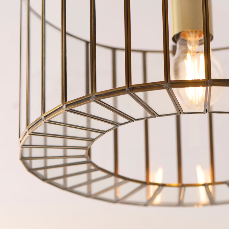 Antalya Flush Ceiling Light in antique solid brass shown in a room setting