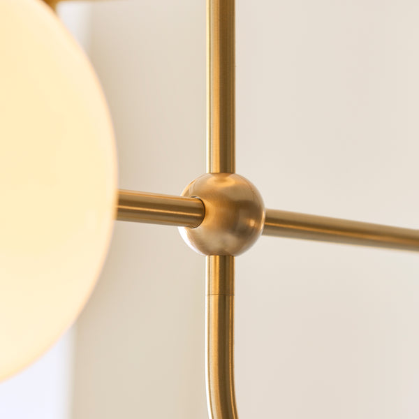 Detail of the brushed aged brass finish on the Ottowa 5 Light Pendant