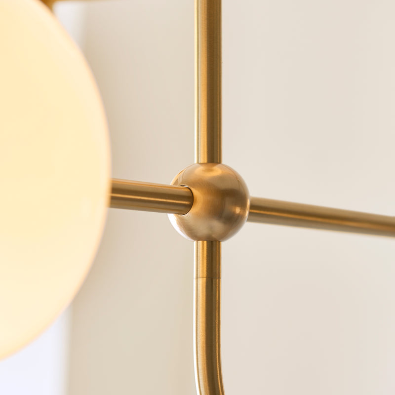 Detail of the brushed aged brass finish on the Ottowa 5 Light Pendant