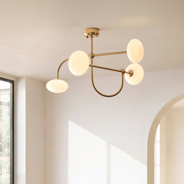 Ottowa 4 Light Semi Flush Ceiling Light in brushed aged brass on a living room ceiling