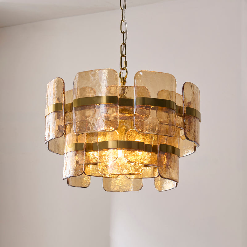 Ancara 3 Light Pendant in brushed aged brass shown in a room setting