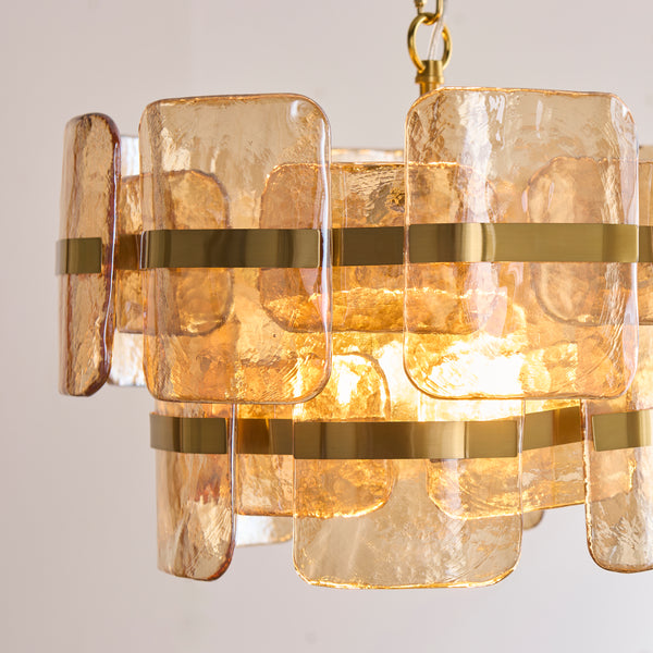 Close-up of the champagne handmade textured glass on the Ancara 3 Light Pendant