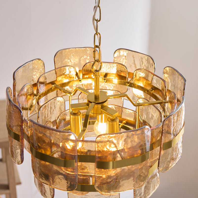 Detail of the brushed aged brass finish on the Ancara 3 Light Pendant
