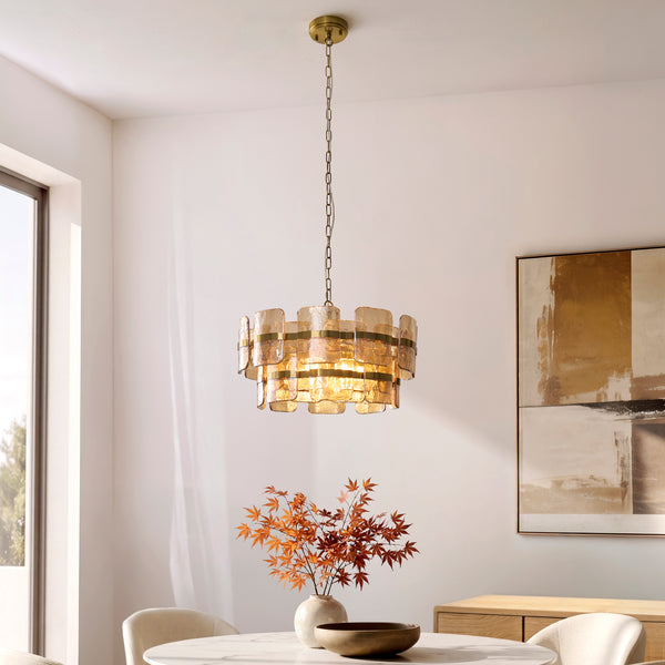 Ancara 6 Light Pendant in brushed aged brass hanging in a dining room