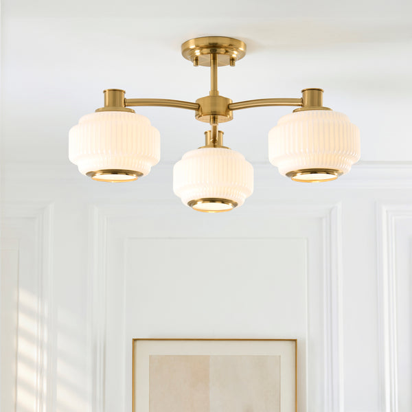 Evora 3 Light Semi Flush Ceiling Light in brushed aged brass on a bedroom ceiling
