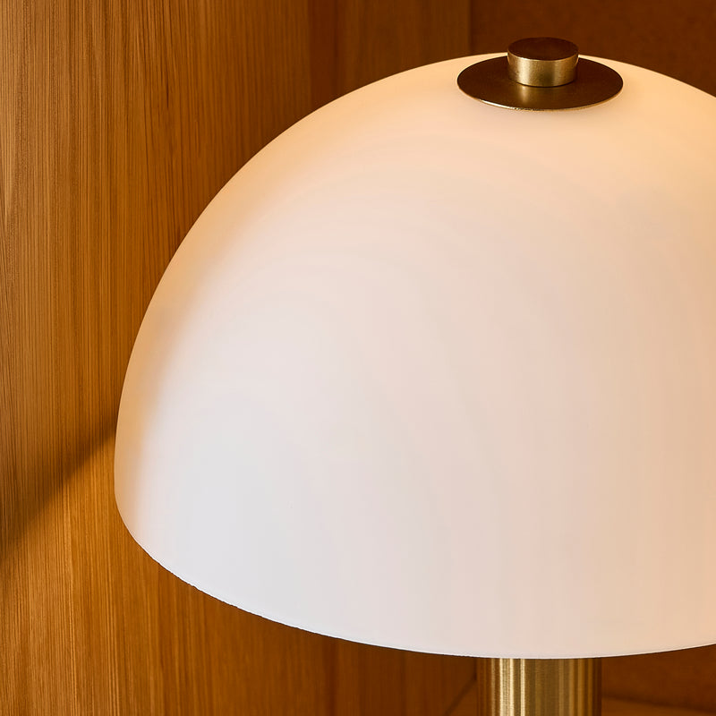 Bridport Rechargeable Table Lamp lit up in a dining room setting