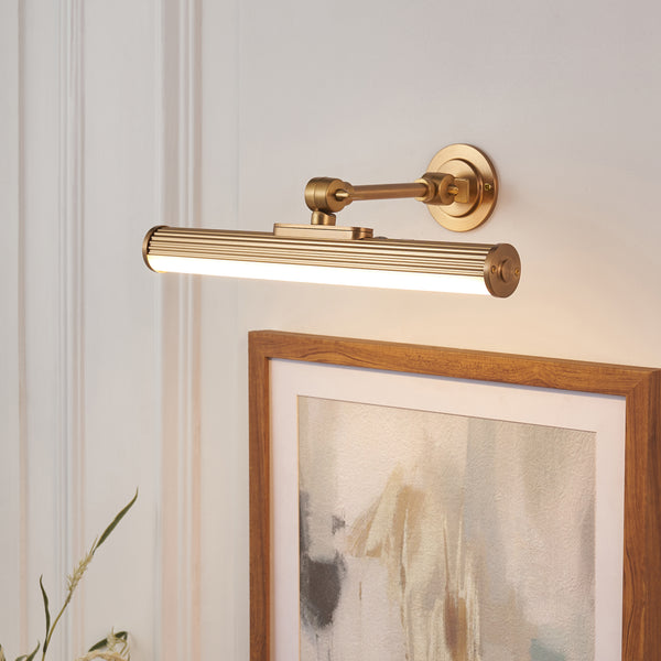 Cirali Rechargeable Picture Light lit up in a styled living room