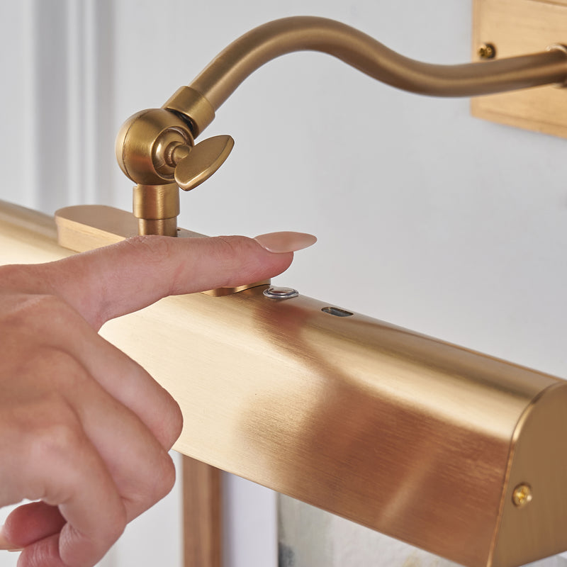 Detail of the warm brass finish on the Lasos Rechargeable Picture Light