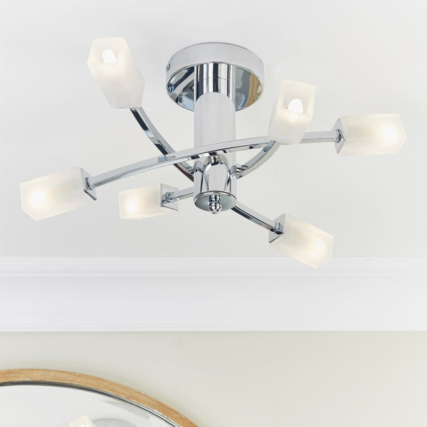 Havana 6 Light Semi Flush Ceiling Light lit up in a styled living room