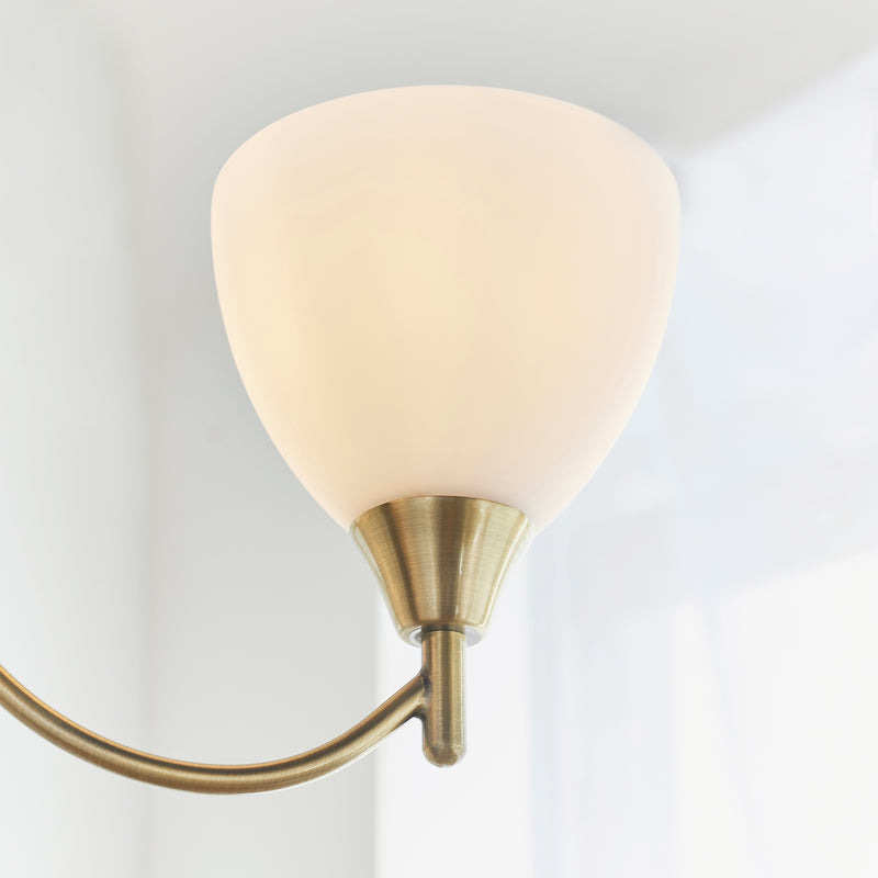 Detail of the antique brass finish on the Alton 3 Light Pendant