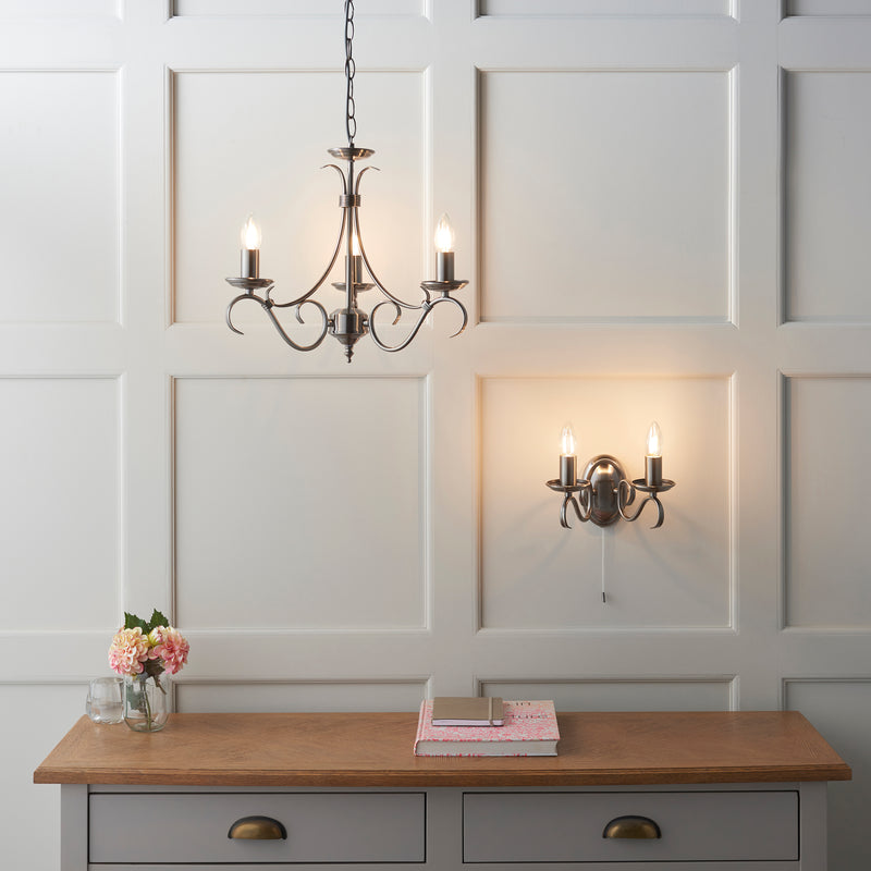 Bernice 3 Light Chandelier in antique brass shown in a room setting
