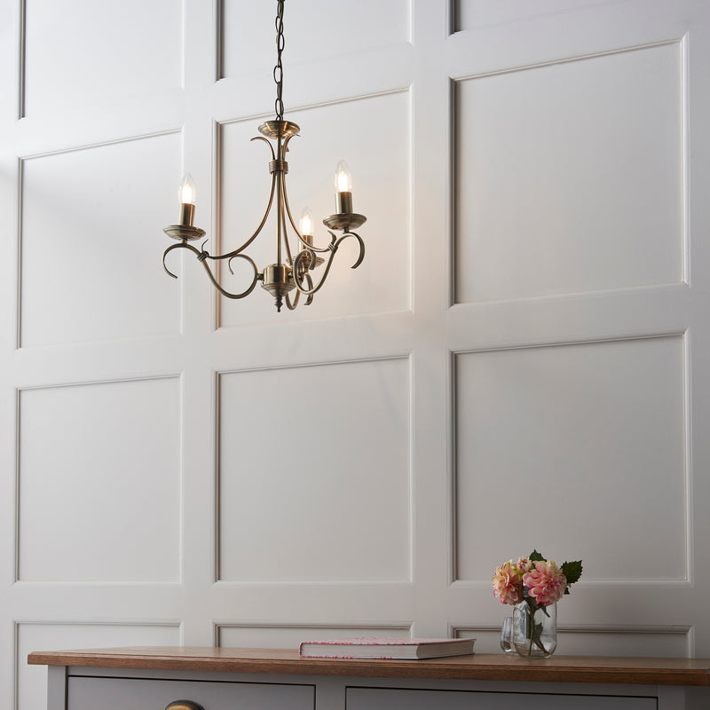 Detail of the antique brass finish on the Bernice 3 Light Chandelier