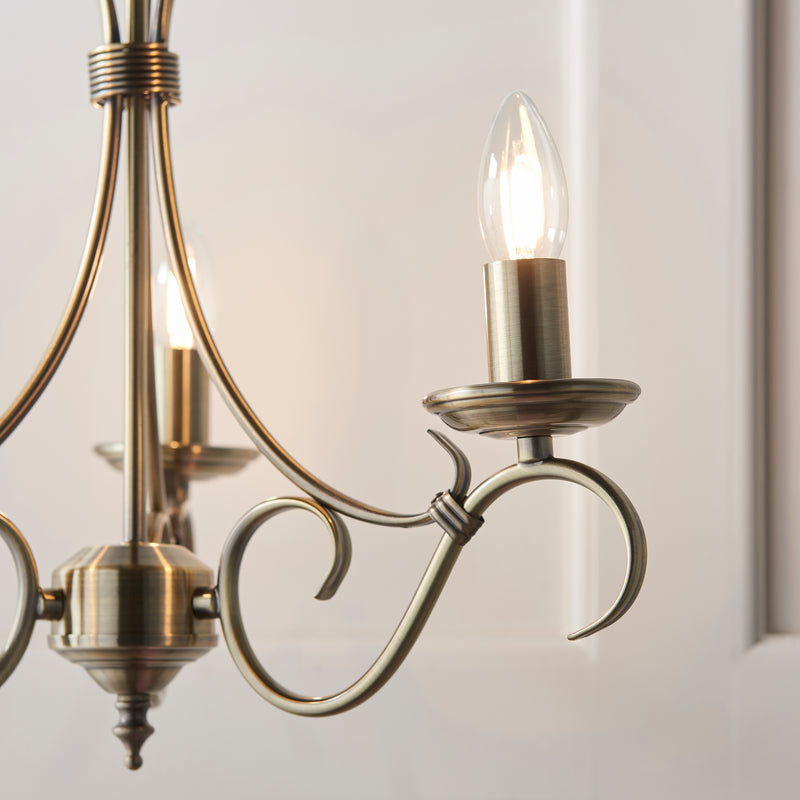 Close-up of the Bernice 3 Light Chandelier ceiling plate and fittings