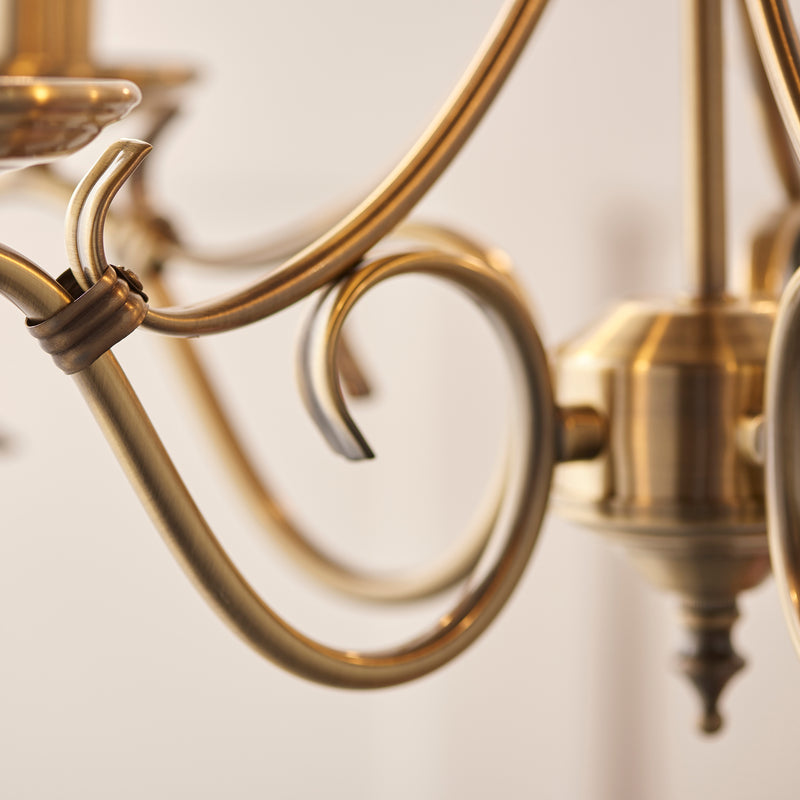 Detail of the antique brass finish on the Bernice 5 Light Chandelier
