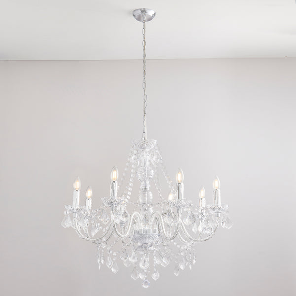 Clarence 8 Light Chandelier in chrome and clear acrylic hanging in a living room
