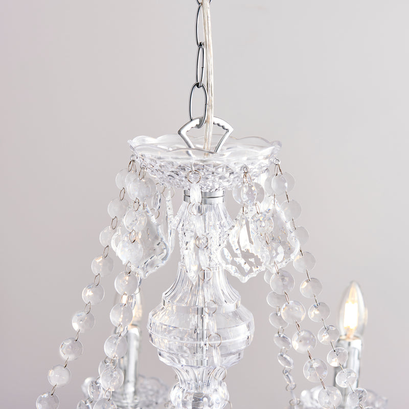 Detail of the chrome and clear acrylic finish on the Clarence 8 Light Chandelier