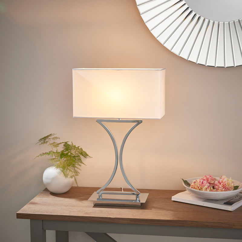 Endon Epalle Table Lamp in chrome in a styled bedroom