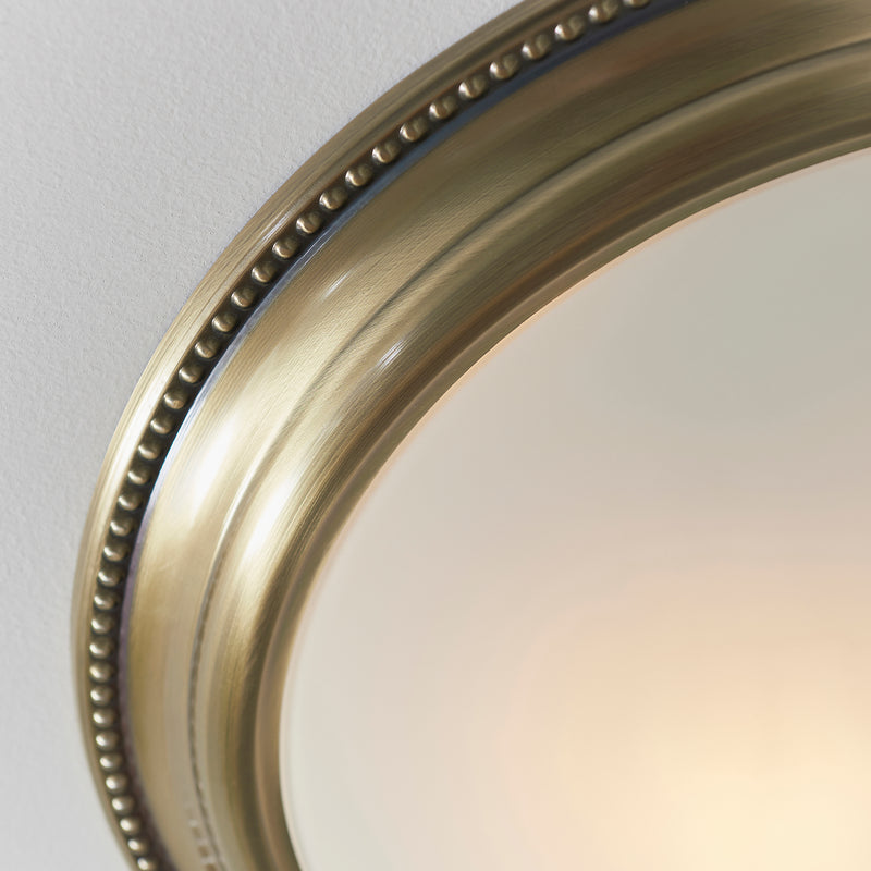 Close-up of the Atlas 2 Light Flush Ceiling Light ceiling plate and fittings