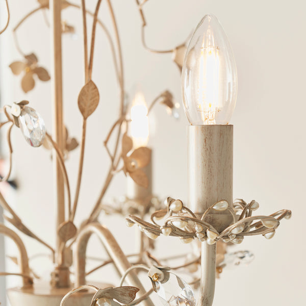 Lullaby 3 Light Chandelier in cream and brushed gold shown in a room setting