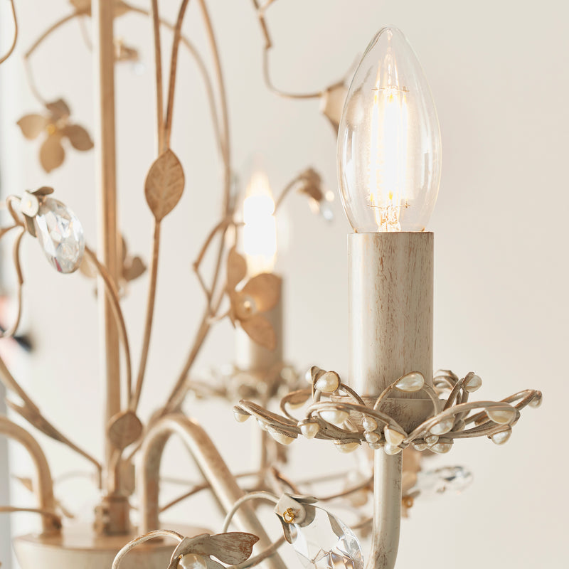 Lullaby 3 Light Chandelier in cream and brushed gold shown in a room setting