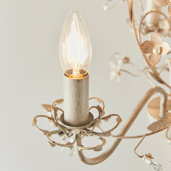 Close-up of the clear and pearl acrylic on the Lullaby 3 Light Chandelier